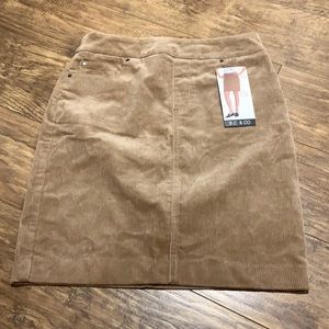 Stretchy tan corduroy skirt by S.C. & Co.